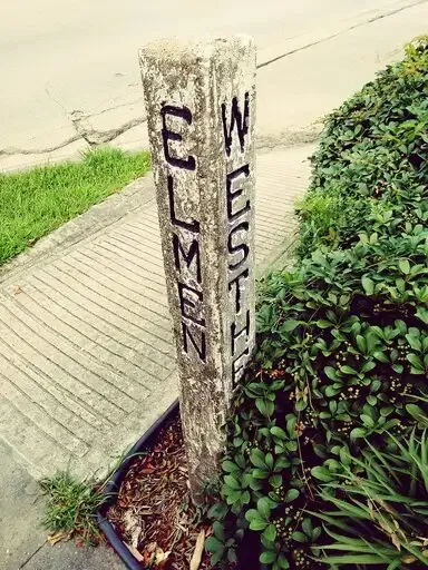 Old street sign post
